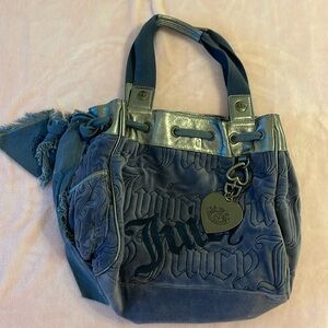 Blue vintage juicy couture bag, with silver accents. In good condition